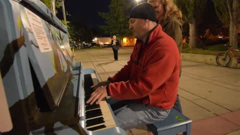 James Elser playing Your Song on a Piano in the Park