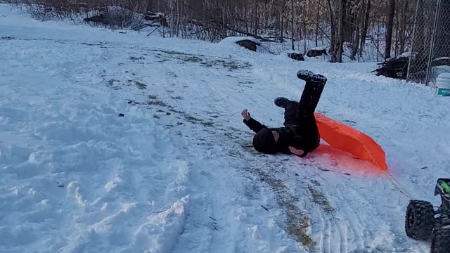 RC Car Pulls Kid on Sled