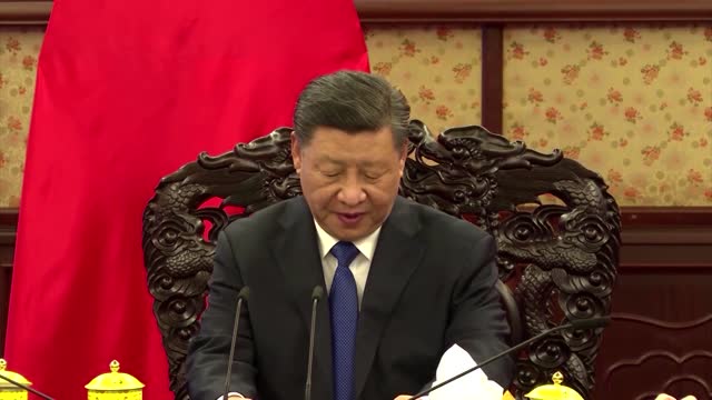 China's Xi says HK situation improved from 'chaos'