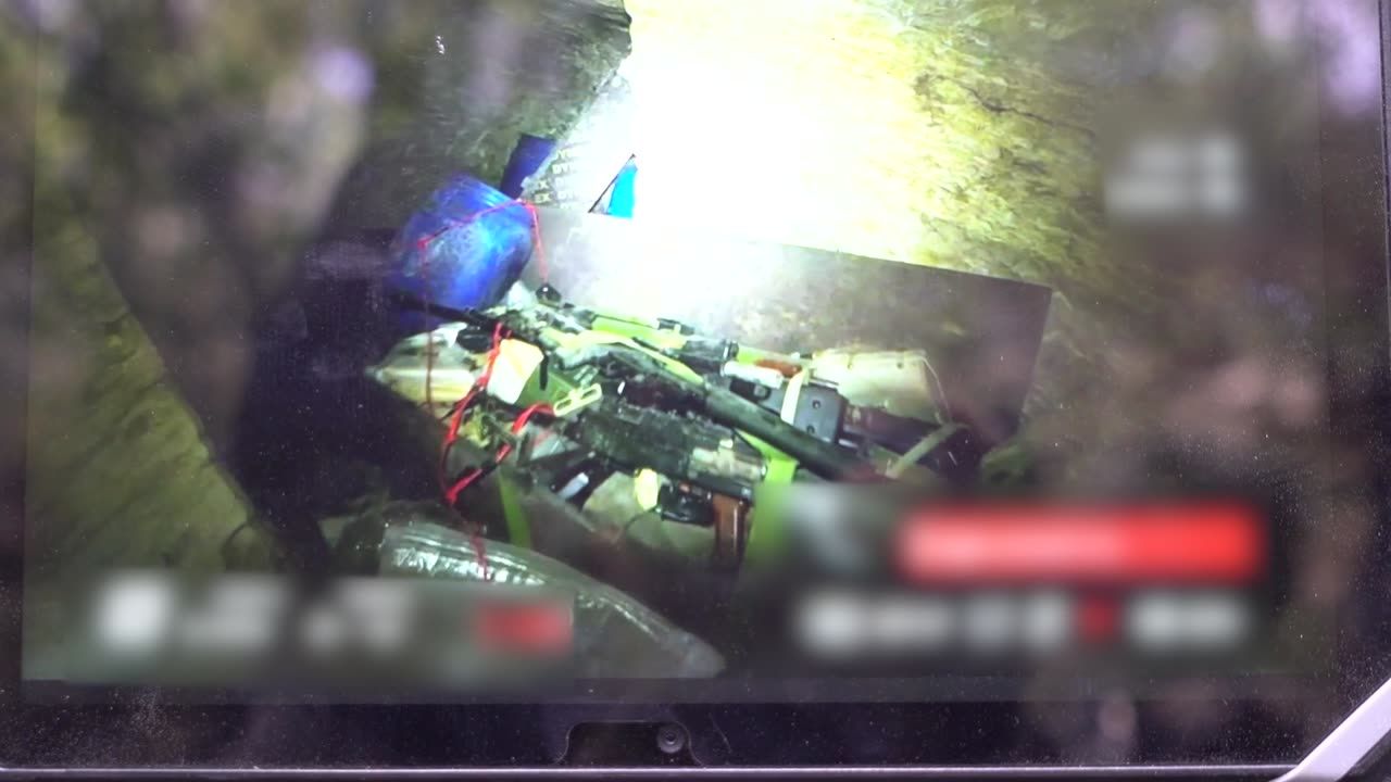 Attached is footage of weapons and underground tunnel shafts found