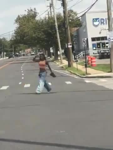 Woman pointing gun at people on New York streets gets SURPRISED by what the Police do next