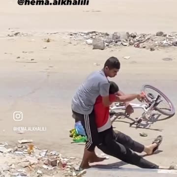 Brave young Palestinians rescued a sniped civilian in Alwehda street.