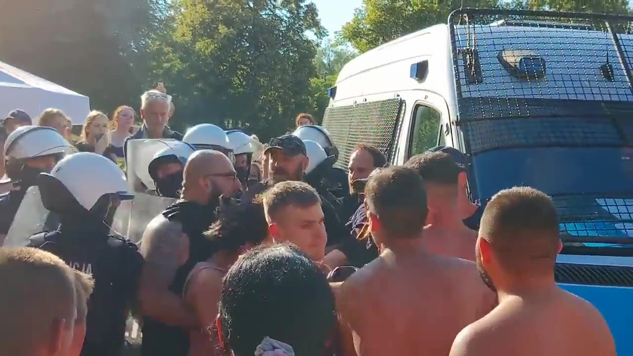 Police protect migrant rapists from mob after attack in public pool, Poland