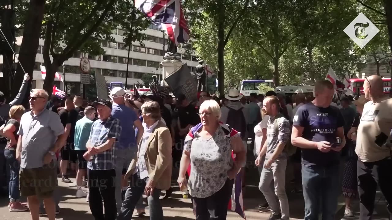 'We want our country back': Thousands march at Tommy Robinson rally