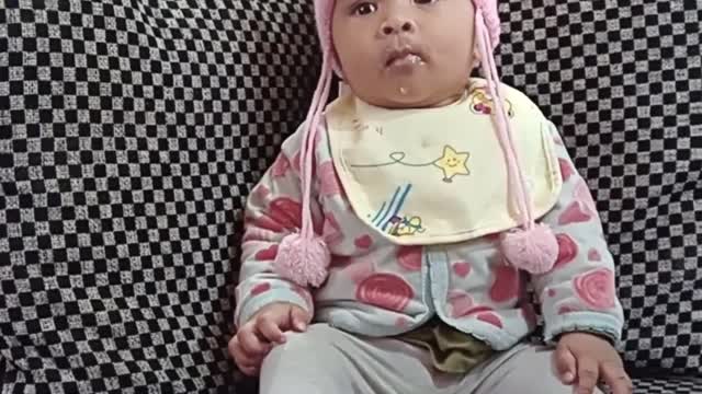 6 months baby enjoying her food.....