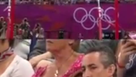 Aly Raisman's parents watching her compete is HILARIOUS! woman doing cartwheel - Shorts