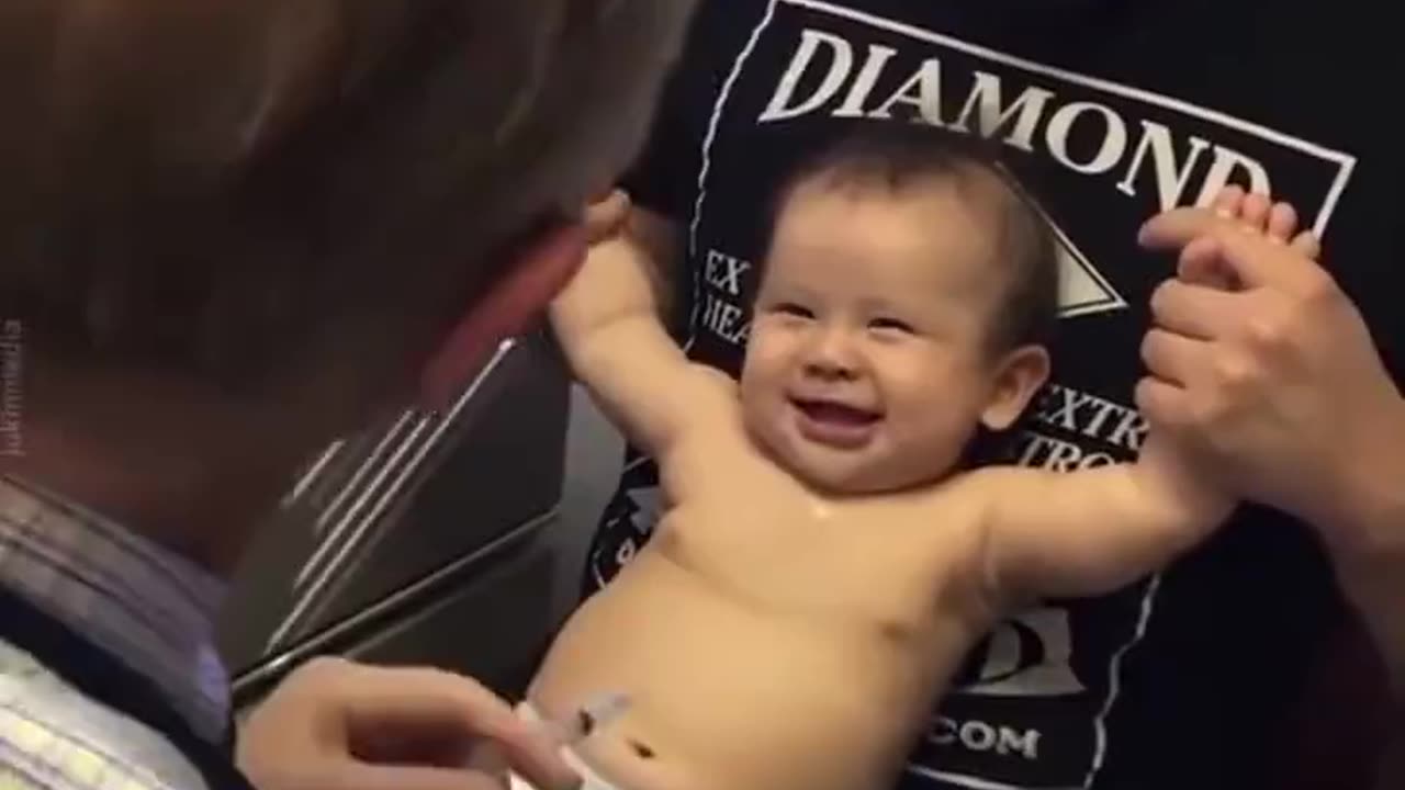 Doctor Engages Baby in Playful Act Before Injection "Gentle Care"