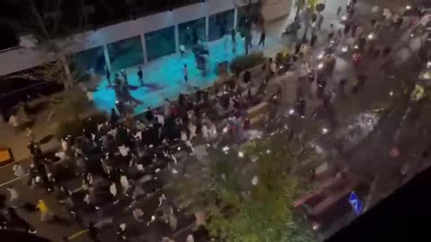 PROTESTORS SHOUTING "UNITY IS STRENGTH" IN CHINA