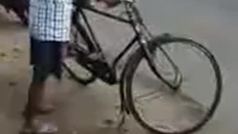 Funny Drunken man riding his cycle