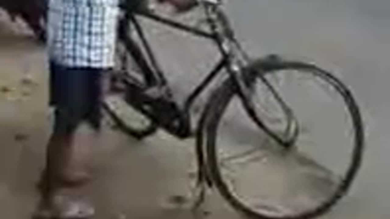 Funny Drunken man riding his cycle
