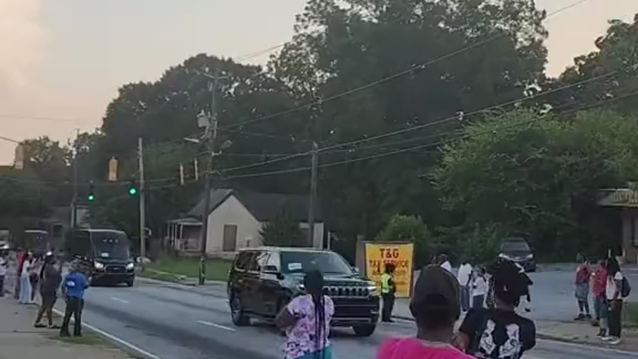 Donald Trump driving through the urban, poor neighborhoods of Atlanta