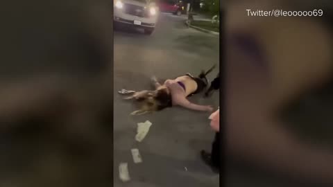 security guard slaming woman to the payment in parking