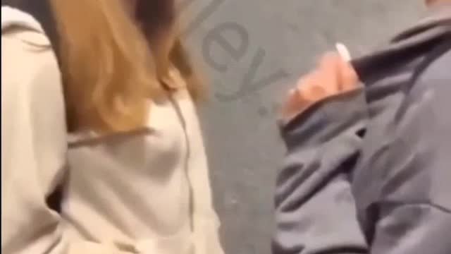 GIRL GETS KNOCKED OUT FOR TRYING TO TALK TO ANOTHER GIRL'S BOYFRIEND.