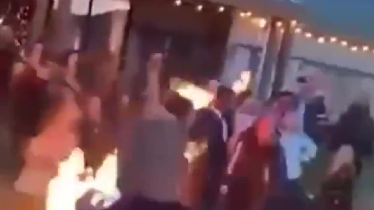 Bride and groom set fire to their costumes during the ceremony