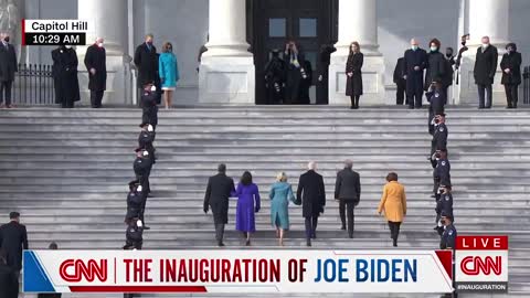 Biden and Harris climb the steps of the Capitol, which was crushed by Trump supporters 2 weeks ago