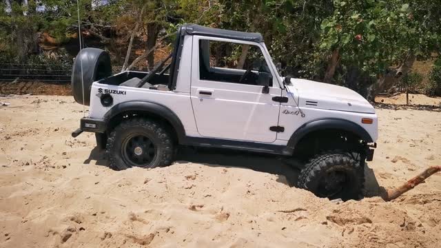 Monster jeep stuck in the sand