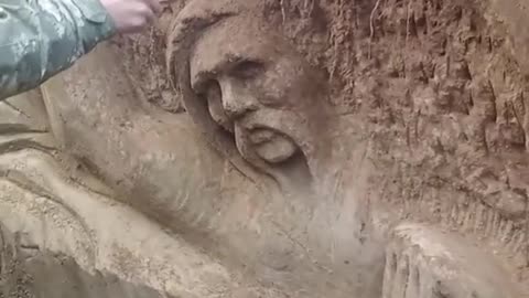 Ukrainian Soldier Creates Work of Art in Trench