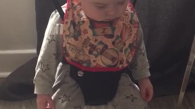 Tired Baby Falls Asleep While Strapped In Baby Jumper