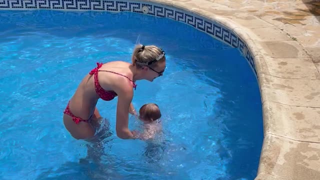 Kid Flops Face First into Pool