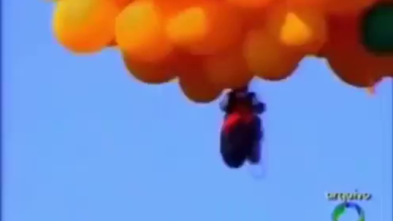 Guy Flies Using Balloons