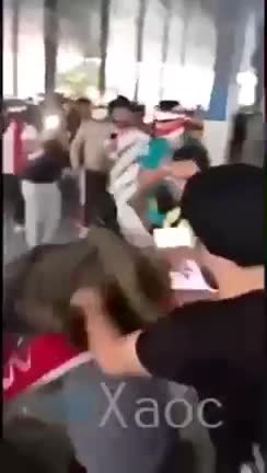 a protestor against the plandemic , something causes smoke to come out of his eyes i