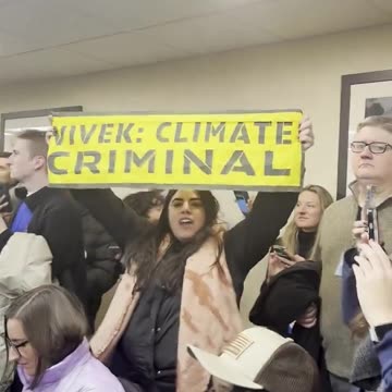 Vivek Ramaswamy gets interrupted by climate protestors during a campaign event in Iowa