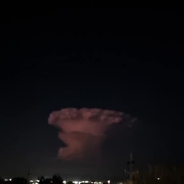 STRANGE PINK CLOUD SEEN WITH LIGHTNING AND THUNDER IN IT