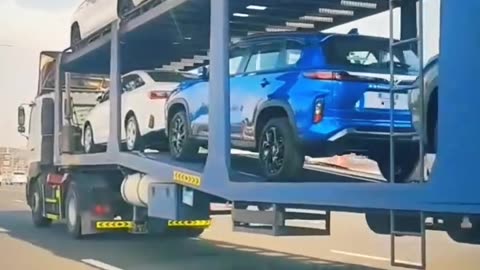 Unveiling the Action: Open Trailer Car Shipping in Motion! 🚗✨