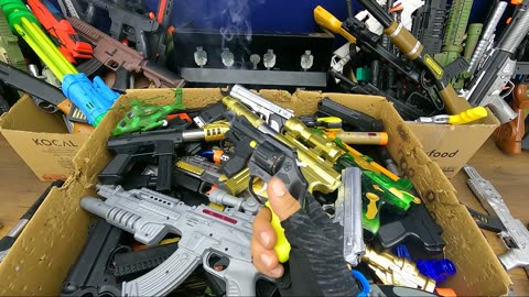 A Wooden Chest of Toy Guns, War Armories, Heavy Machine Guns, High-Range Weapons