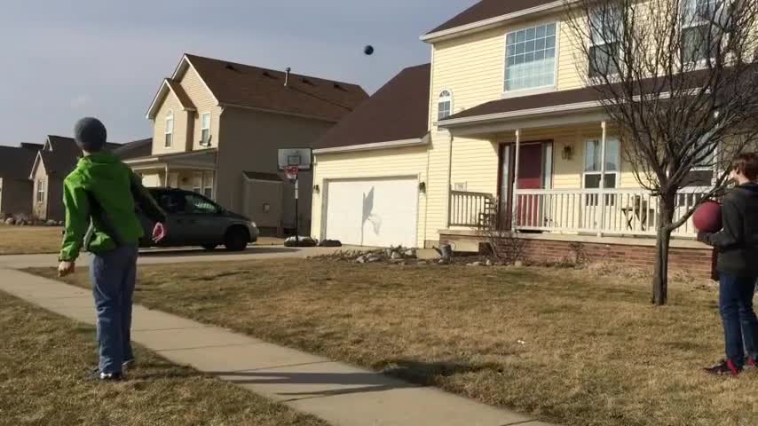 Guy Makes Lucky Basketball Shot While Friend Attempted Juggling Trick