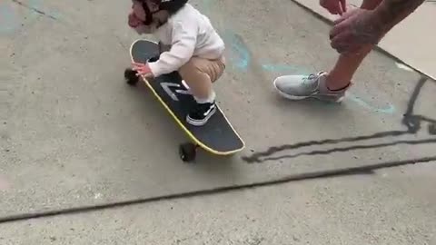 Incredible skateboarding baby