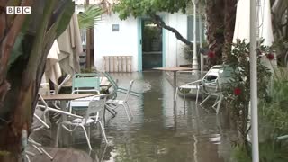 Severe flooding hits Spain's east coast after record rainfall - BBC News