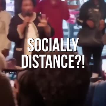 Abrams, Maskless, Gives Directions For A Photo