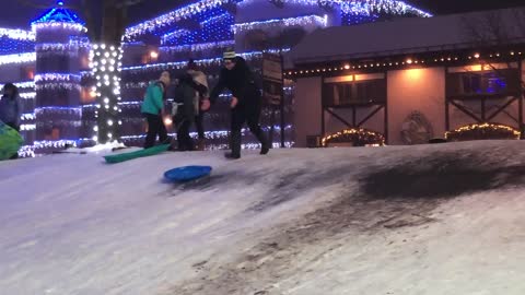 Man Faceplants As He Runs Down A Snowhill To Chase After His Sled