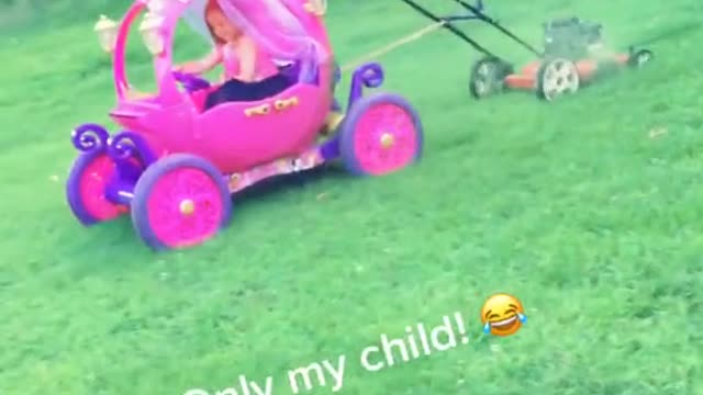 Kid Mows Lawn With Toy Car