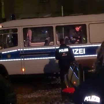 Berlin Germany - Police caught beating an arrested citizen in a Police Van