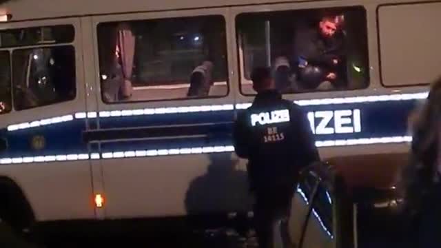 Berlin Germany - Police caught beating an arrested citizen in a Police Van