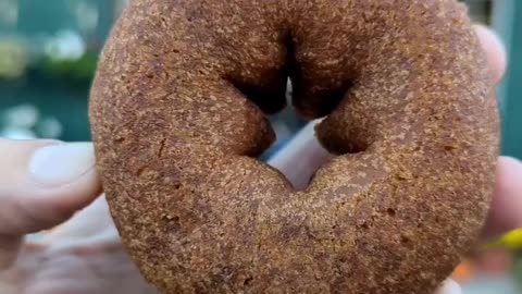 The golden brown ring is a doughnut.