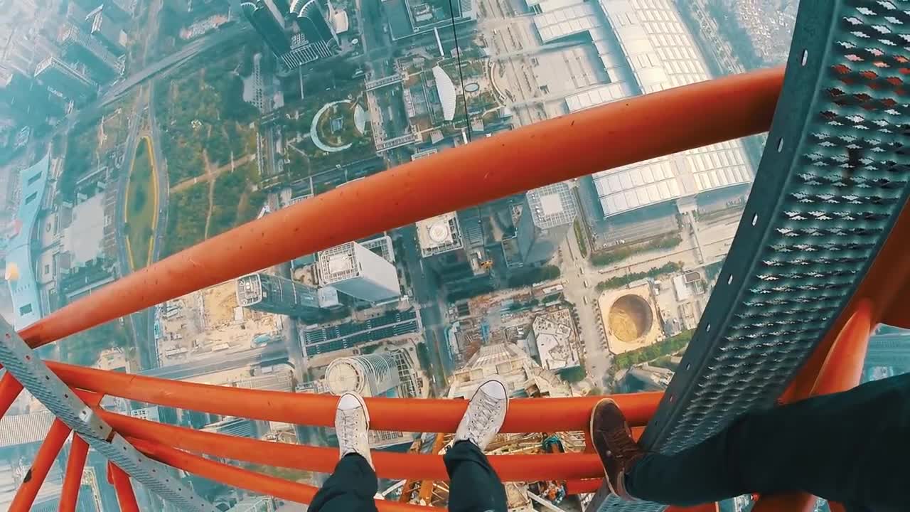 These Brave Daredevils Are Free Climbing On A 2,165 Foot Skyscraper