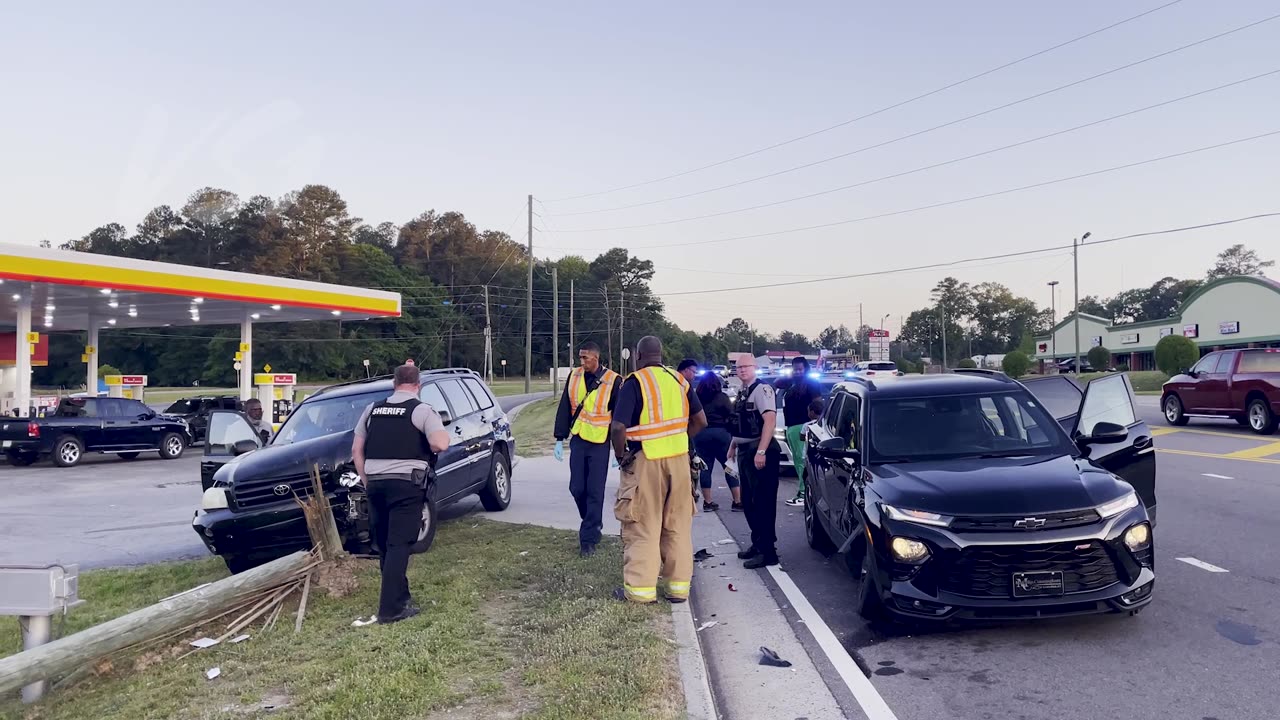 Car crash takes down pole and googly eyes from cops