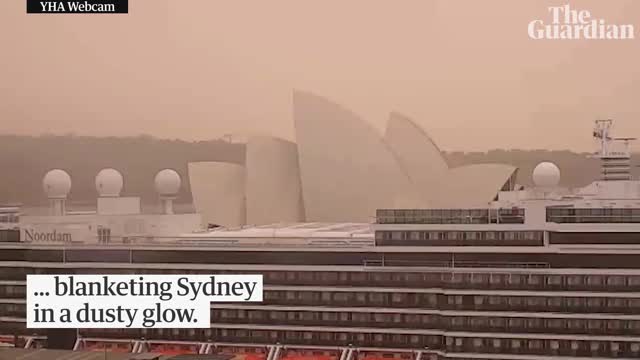 Dust storm's ominous red wall moves from outback to Sydney