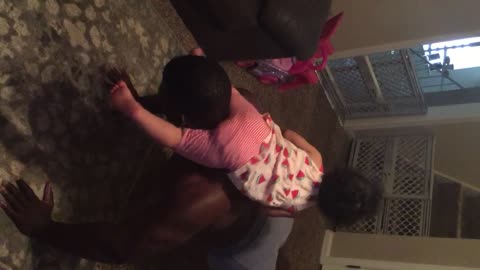 Rockstar daughter enjoys pushups with father