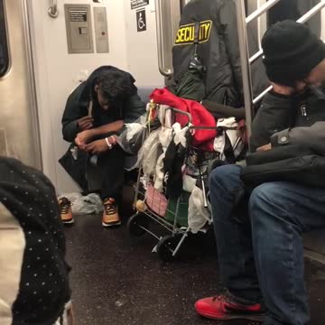 Guy gives himself a pedicure and files toenails on subway train