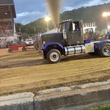 Truck Pulling Dirt Track Huge Weight