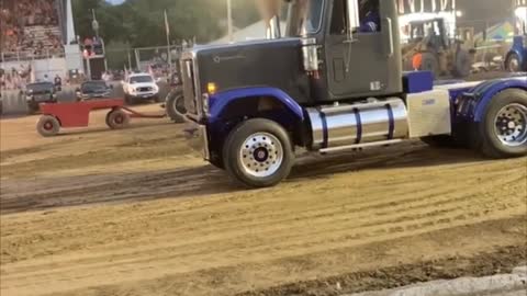 Truck Pulling Dirt Track Huge Weight