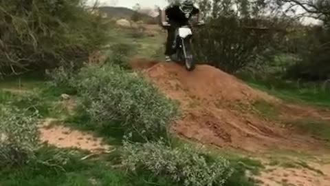 Collab copyright protection - dirt ramp black shirt over handlebar