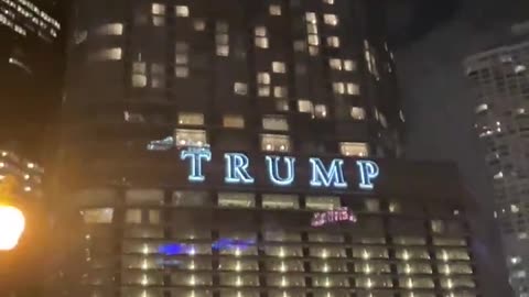“Project 2025 HQ” is projected on Trump Tower in Downtown Chicago
