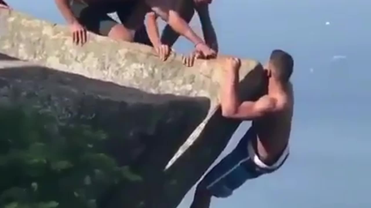 Man Clinging for Dear Life