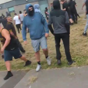 The English are at a migrant hotel and they’ve had it with fake refugees living off their taxes.