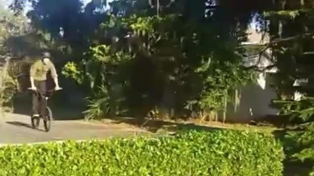 Guy in green crashes face plant